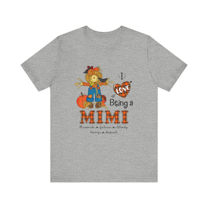 I Love Being a Grandma Tee, Mimi Personalised Kid's Name T-shirt - Custom Fall T-Shirt, Gift for Grandmothers, Family Gatherings, Autumn Celebrations, Scarecrow Design